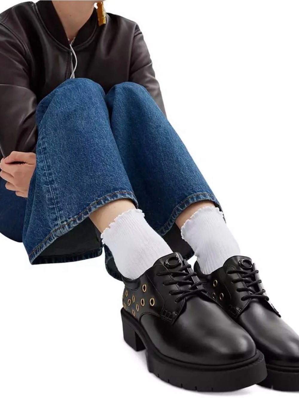 Coach Black Leather Lug Sole Loafers with Gold Eyelet Detail